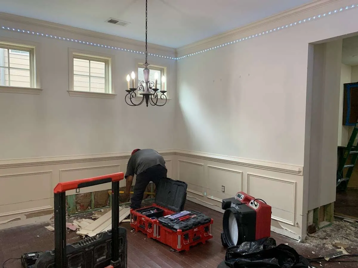 Restoration technician with professional equipment in Greenbrier